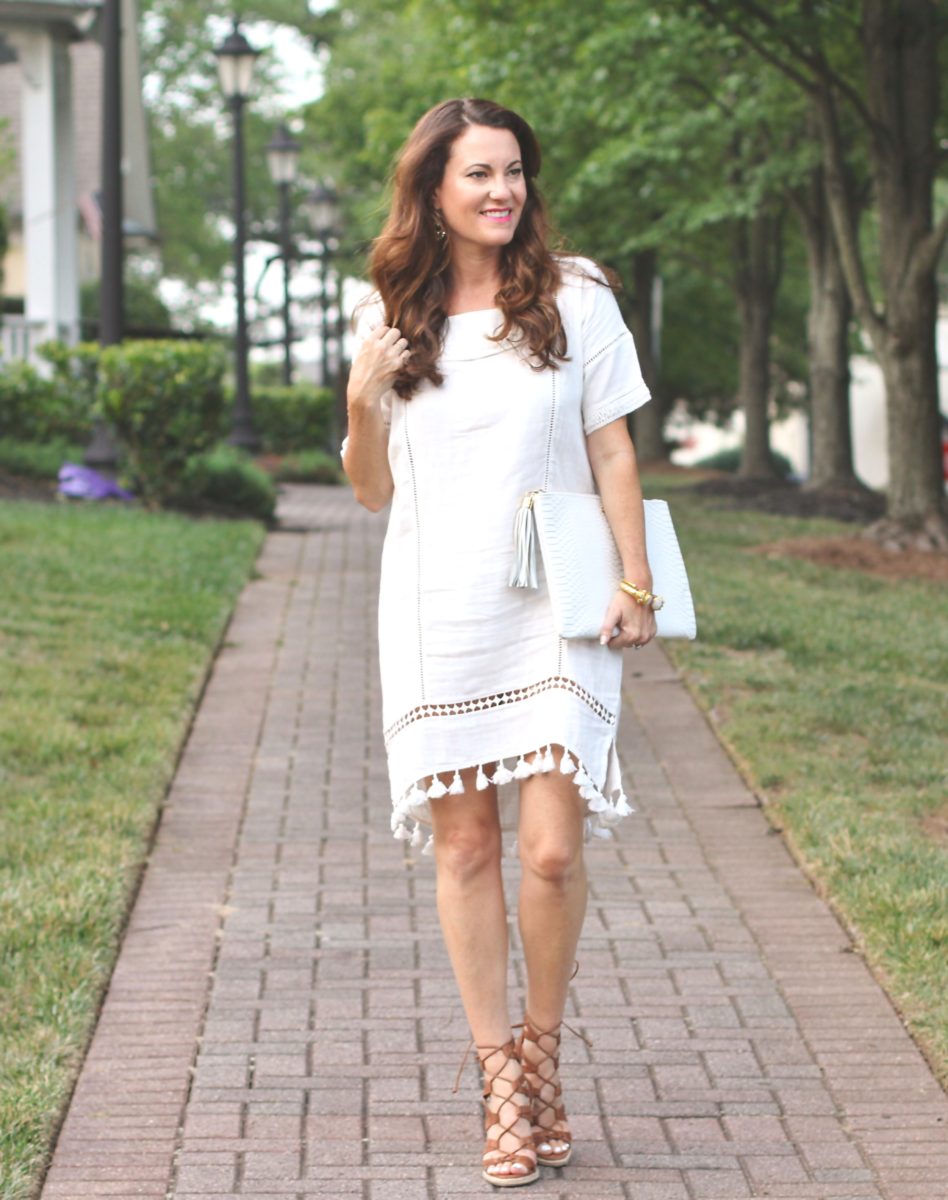 Cute tassel dress for the perfect summer date night look via Peaches In A Pod.